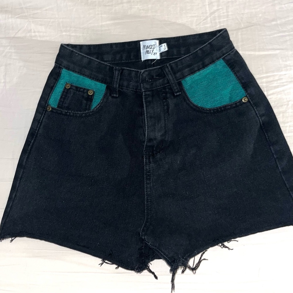 Black high rise jean shorts w green pockets